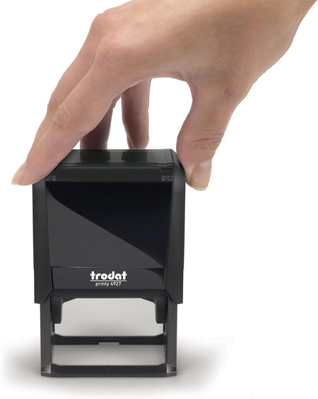 Trodat 4927 Stamp wit hand for size reference