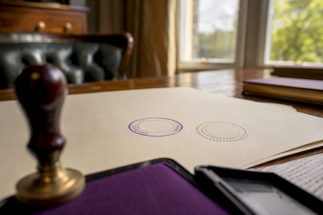 Close-up of notary ink stamp and embossed seal