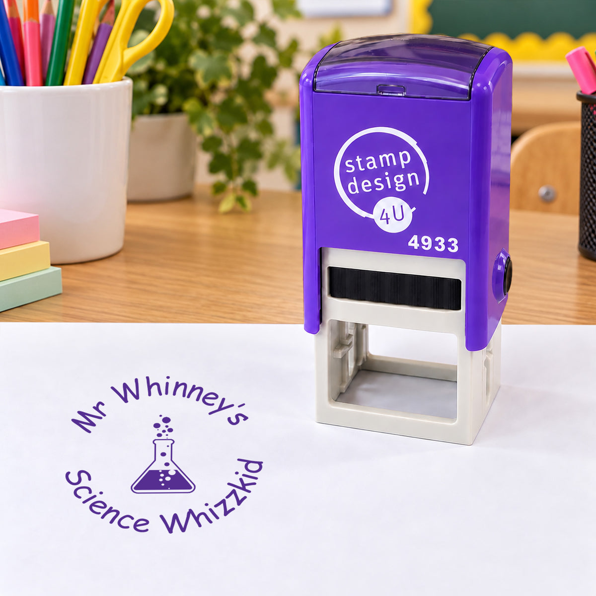 Purple SD4U 4933 Science teacher stamp on a classroom desk with a violet personalised sample impression and laboratory flask design