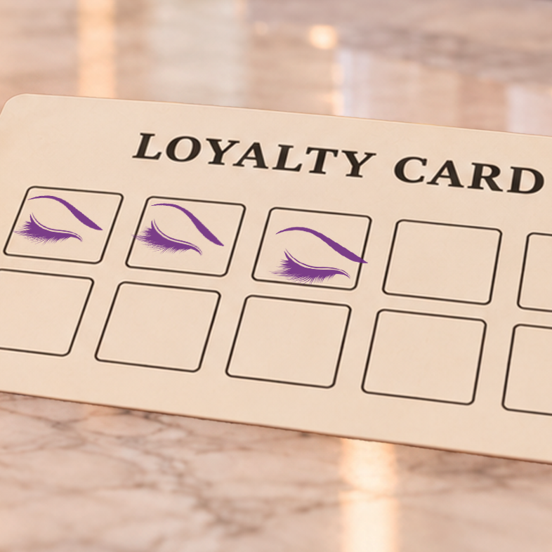 Close-up of violet eyelash impressions in loyalty-card boxes