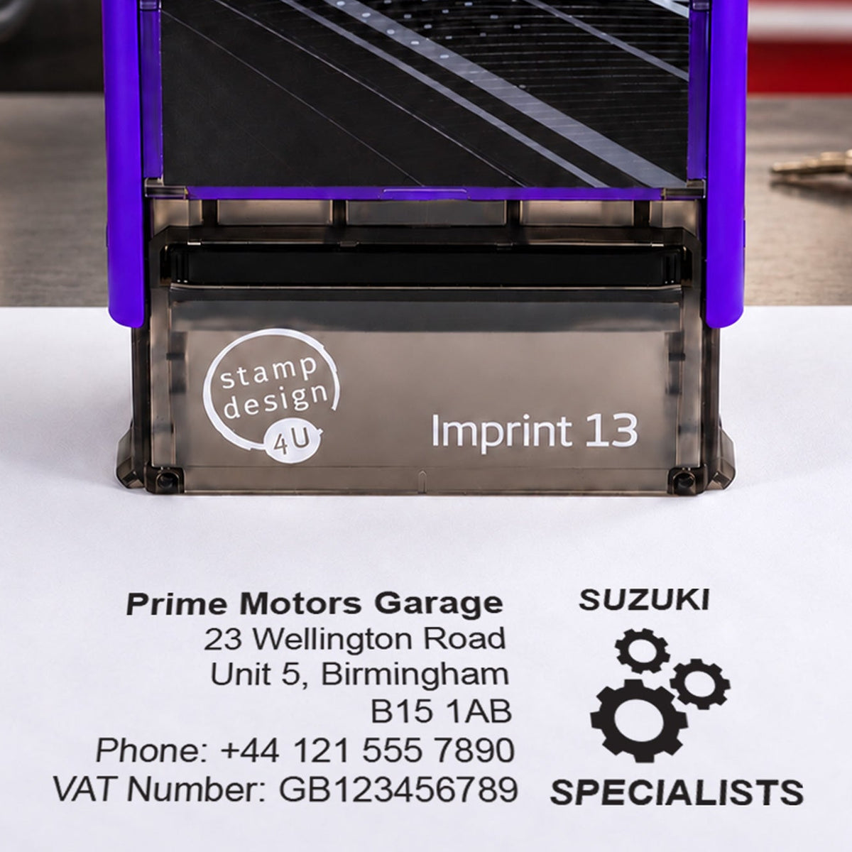 SD4U Imprint 13 Suzuki Specialists personalised garage stamp, close-up and black example impression