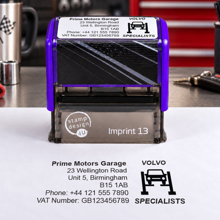 SD4U Imprint 13 Volvo Specialists personalised garage stamp on a workshop bench with a black example impression