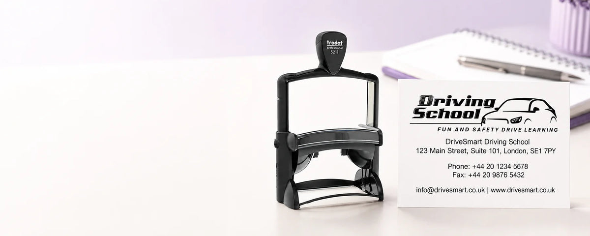 Trodat Professional 5211 large text and logo stamp beside its matching driving school impression