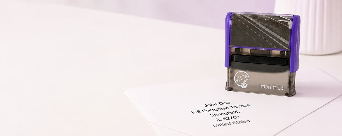 Stamp Design 4U Imprint 13 medium text stamp beside its matching five-line address impression